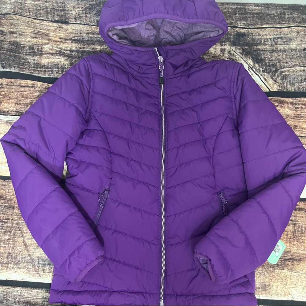 Girls purple jacket by DSG is NWT. Size medium